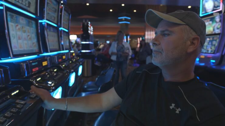 man playing slots