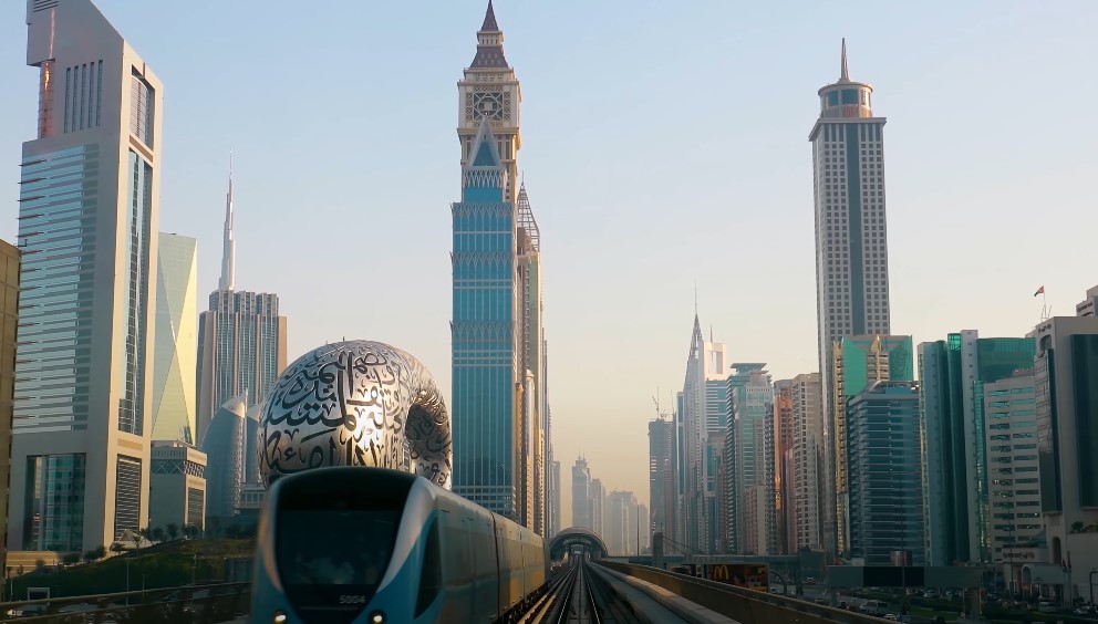Skyscrapers pierce the pale Dubai sky