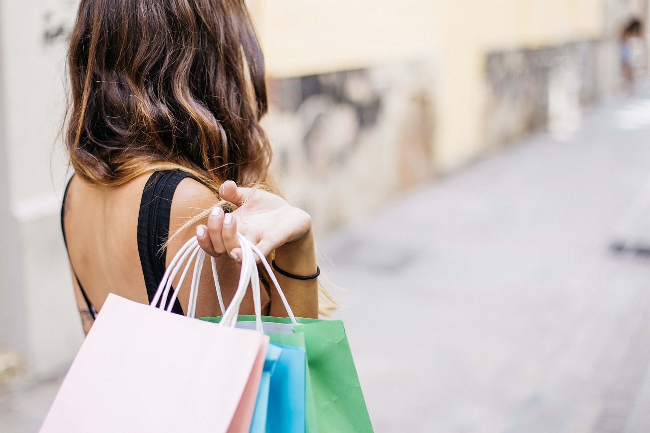 Woman shopping with sale bags