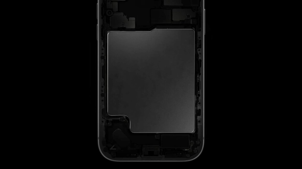 Close-up view of a smartphone battery inside a black device frame.
