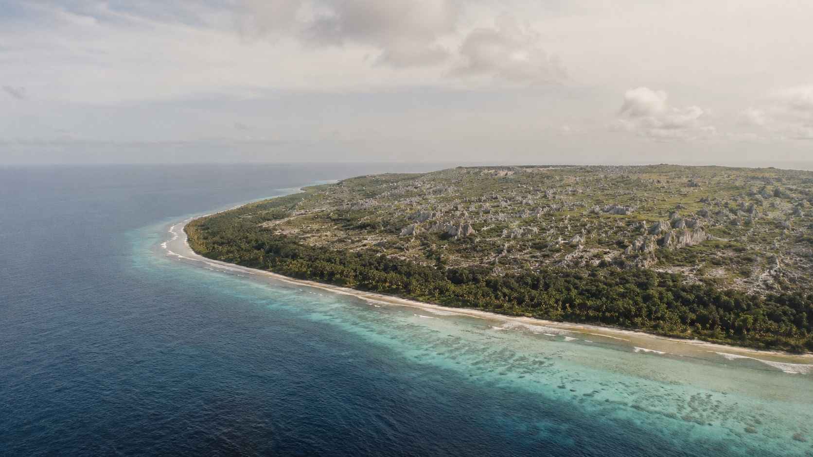 Aerial view of Naoero surrounded by turquoise Pacific waters