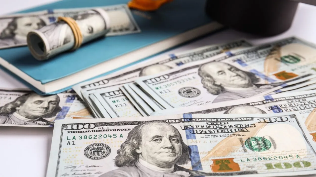 Cash and textbooks represent additional NYU academic costs.