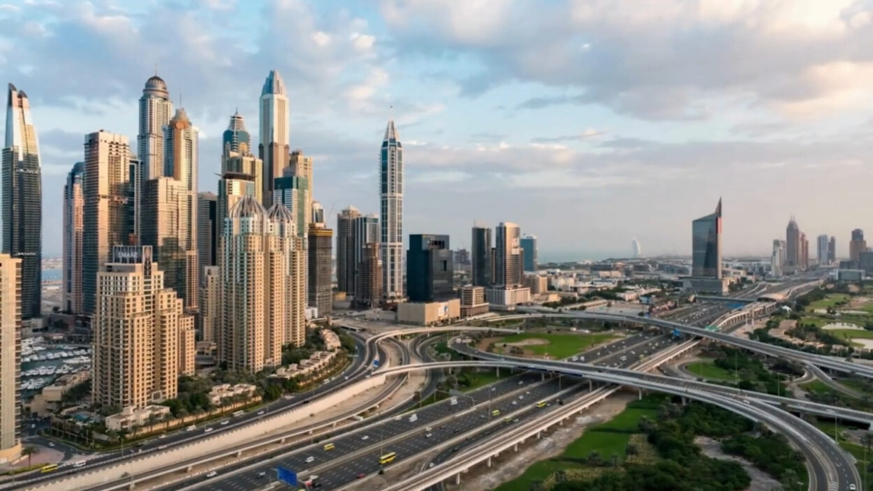 Dubai skyline with modern skyscrapers and busy highway interchanges